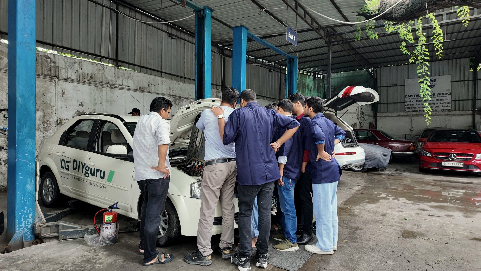 DIYguru students at a 4-wheeler EV workshop